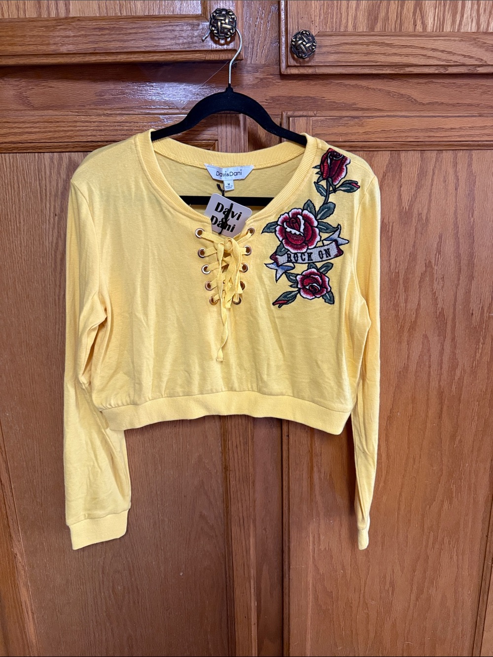 DAVI & DANI Yellow Lace-Up Cropped Sweatshirt with Rose Embroidery